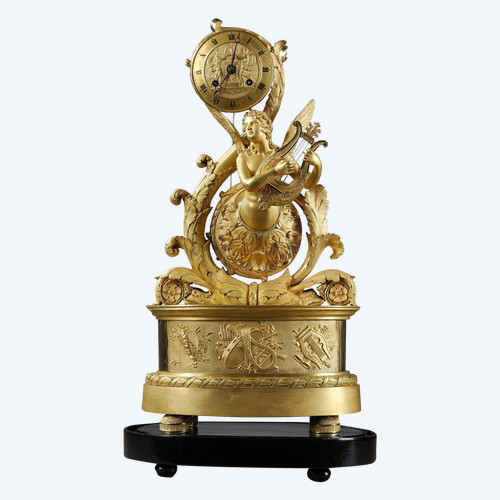 GILT BRONZE CLOCK WITH WINGED GENIE, CHARLES X PERIOD 