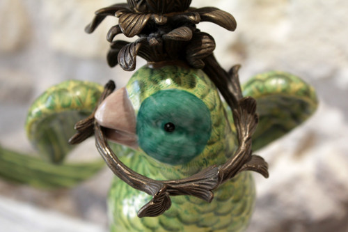 Pair of earthenware parrots forming torches with bronze mounts 20th century