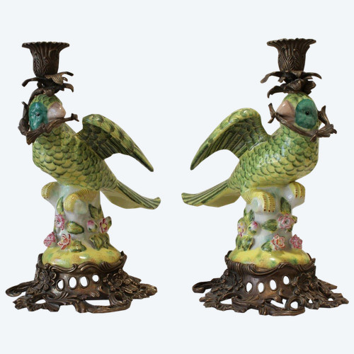 Pair of earthenware parrots forming torches with bronze mounts 20th century