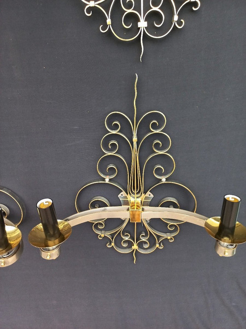 Suite di quattro lampade da parete in ottone dorato, circa 1940