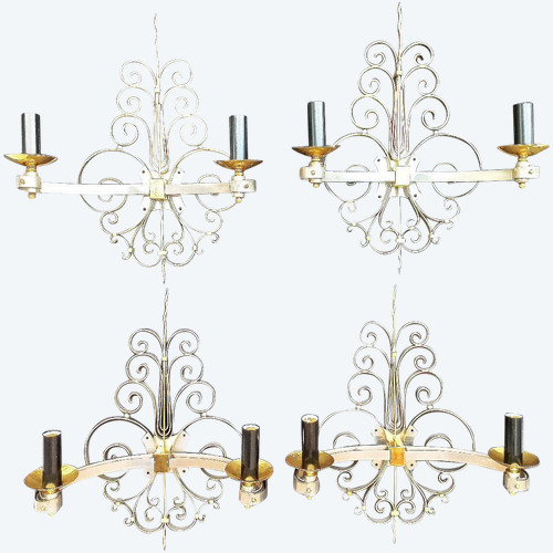 Suite di quattro lampade da parete in ottone dorato, circa 1940