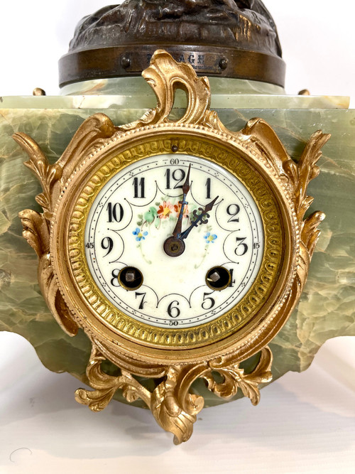 Orologio in marmo con pendolo regula in patina di bronzo di una giovane donna di Emile Bruchon
