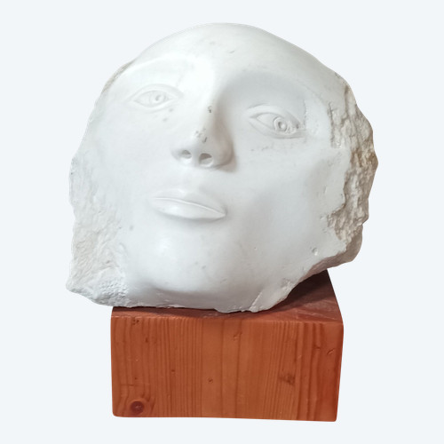 Face bust stone sculpture