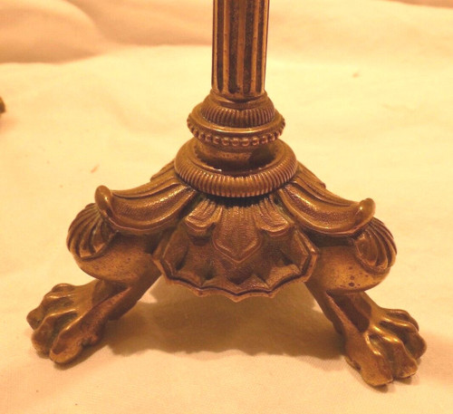 Coppia di candelieri impero in bronzo con piedini ad artiglio di leone
