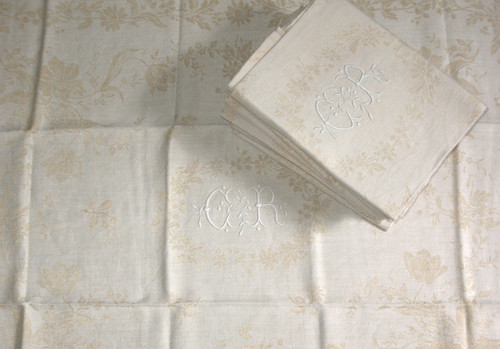 12 napkins in cream floral damask with CR embroidered initials from the early 20th century