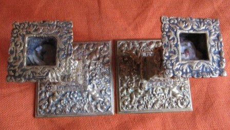 Pair of bronze candlesticks decorated with cherubs 19th century