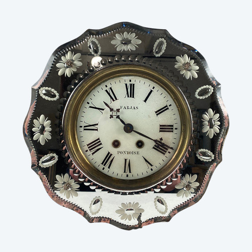 Orologio da parete con cornice curva in specchio inciso
