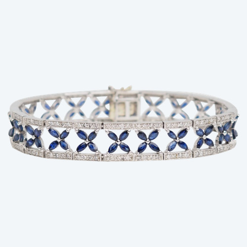 Bracciale traforato in oro bianco, zaffiri e diamanti
