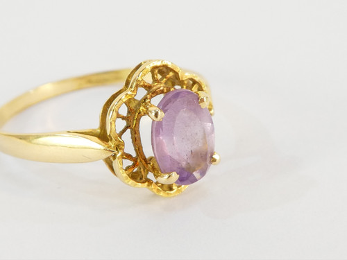Bague en OR jaune 18 carats avec amethyste