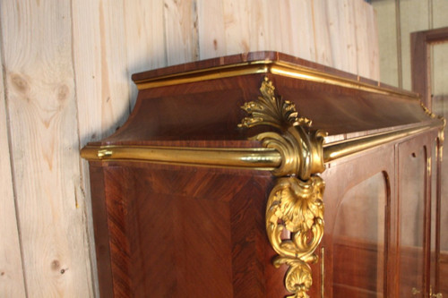 Grande libreria in bronzo dorato e impiallacciato, XIX secolo