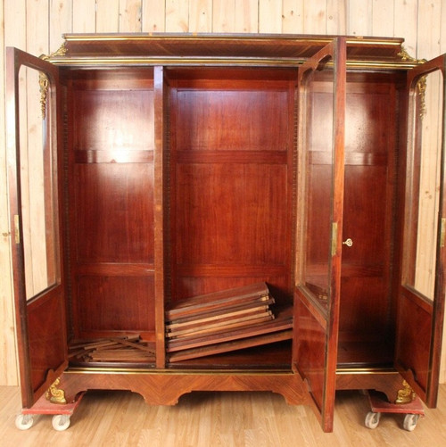 Grande libreria in bronzo dorato e impiallacciato, XIX secolo