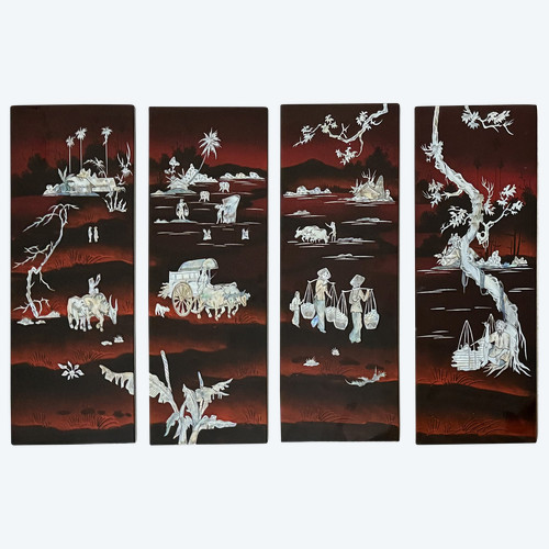 Ensemble de quatre panneaux formant un tableau en laque à décor d'incrustations de nacre