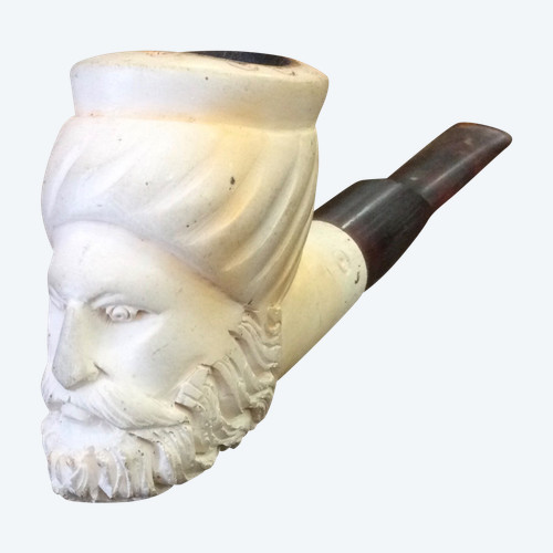 Testa scolpita, pipa 