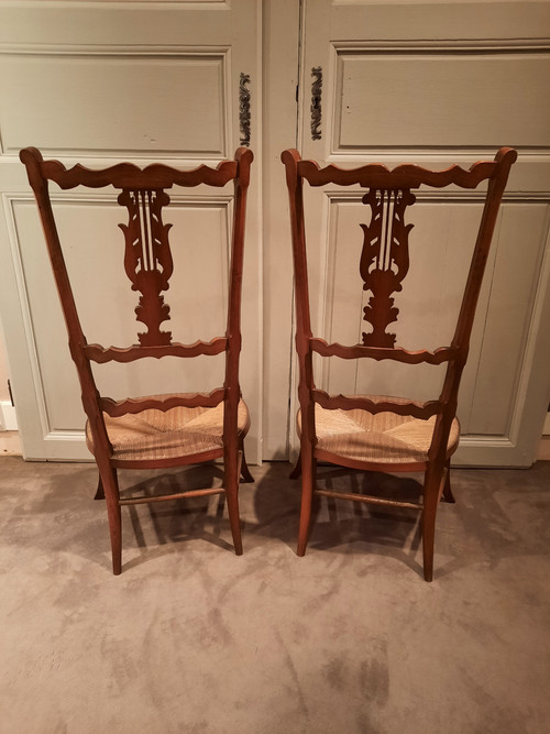 Pair of low cherry changing chairs from the 19th century.