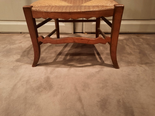 Pair of low cherry changing chairs from the 19th century.