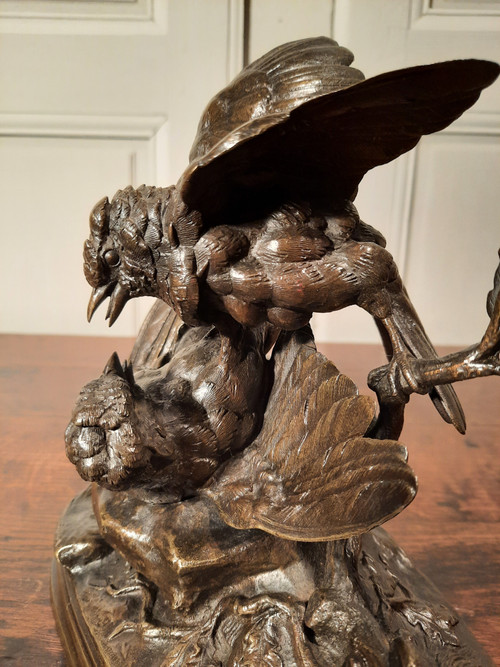 Bronze sculpture representing two birds, signed J. Moigniez from the 19th century.