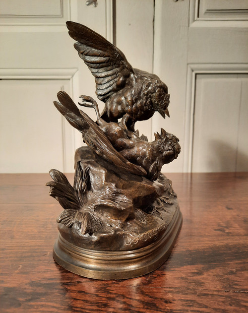 Bronze sculpture representing two birds, signed J. Moigniez from the 19th century.