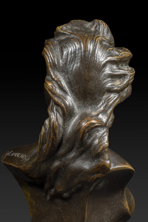 Il Busto di giovane donna con i seni scoperti di Jef Lambeaux (1852-1908):