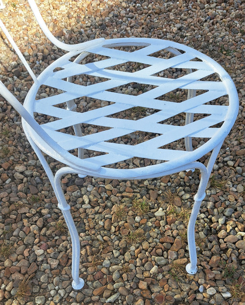 Garden furniture with a chair and a pedestal table early 20th 