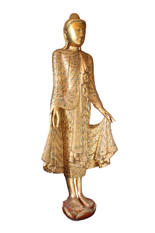 Un grand Bouddha debout en bois doré et incrusté, Thaïlande, 20ème siècle 