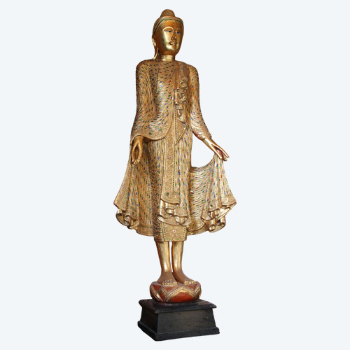 Un grand Bouddha debout en bois doré et incrusté, Thaïlande, 20ème siècle 