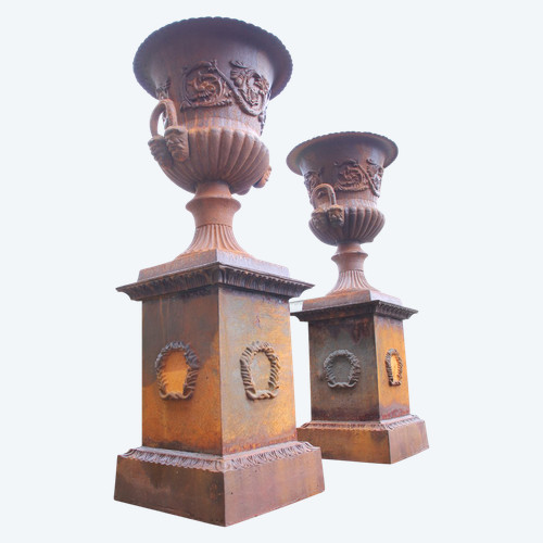Two Large Medici Vases on their cast iron bases 