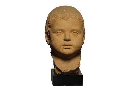 Scultura in terracotta rappresentante testa di bambino 