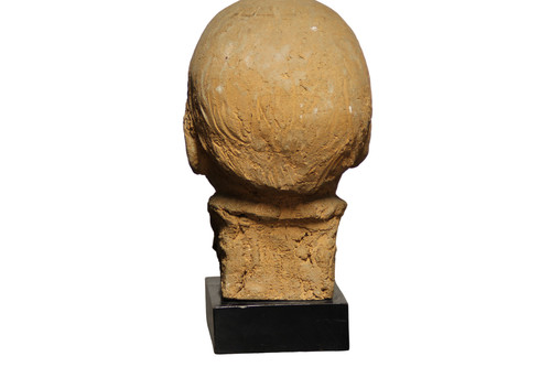 Scultura in terracotta rappresentante testa di bambino 