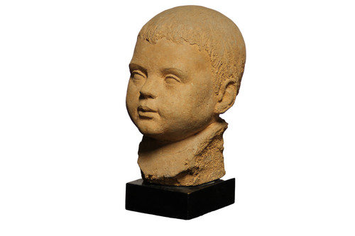 Scultura in terracotta rappresentante testa di bambino 