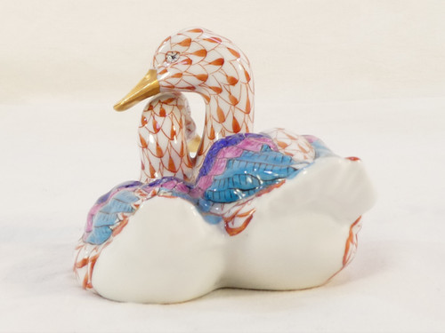 Couple of white porcelain ducks with orange fish scale net pattern 