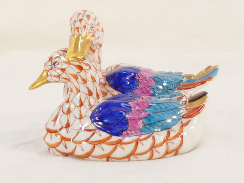 Couple of white porcelain ducks with orange fish scale net pattern 