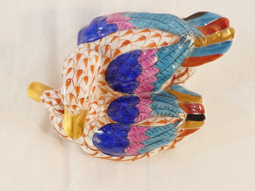 Couple of white porcelain ducks with orange fish scale net pattern 