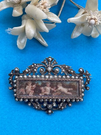 Spilla in argento e oro del XIX secolo.