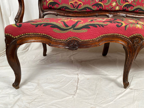 Louis XV-style bench seat upholstered with petit point tapestry, early 19th century
