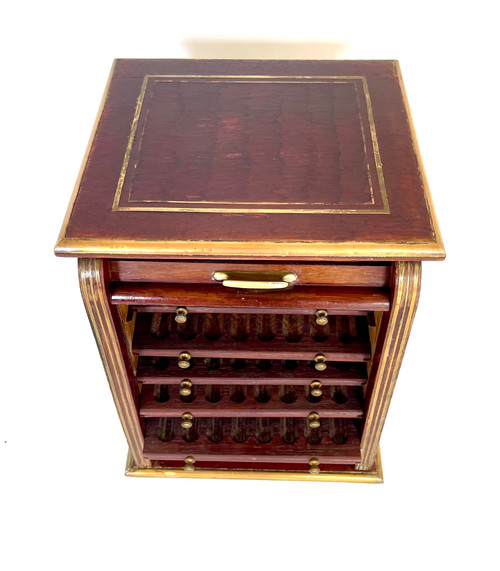 Antique cigar cabinet in mahogany and brass