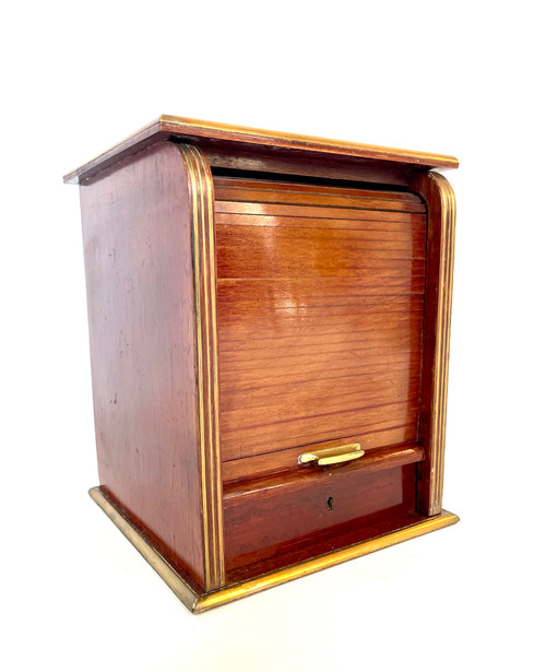 Antique cigar cabinet in mahogany and brass