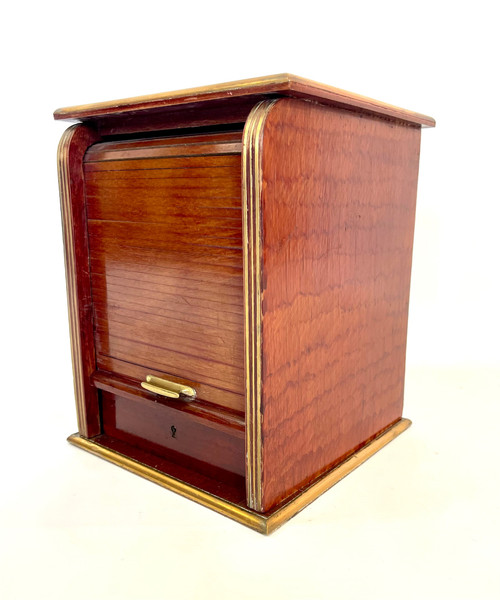 Antique cigar cabinet in mahogany and brass