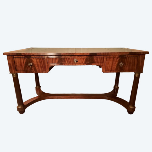 19th century Empire-style mahogany flat desk with two side pulls.