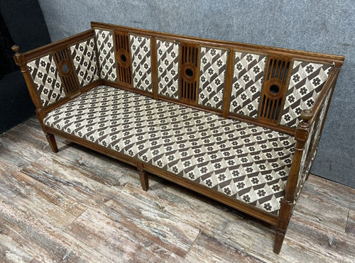 Walnut bench seat in the Louis XVI / Directoire style, late 19th century.