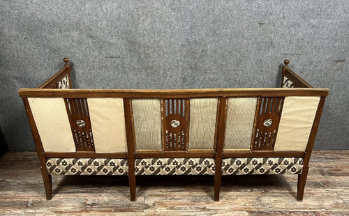 Walnut bench seat in the Louis XVI / Directoire style, late 19th century.