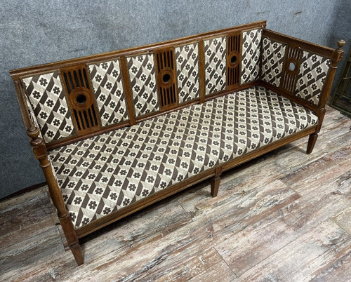 Walnut bench seat in the Louis XVI / Directoire style, late 19th century.
