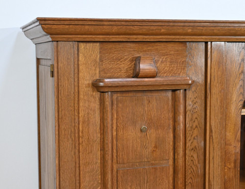 Oak bookcase with three doors