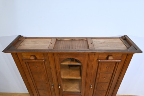 Oak bookcase with three doors