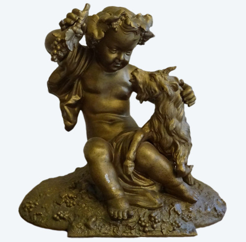 Bacchus enfant, sculpture en fonte d'art dorée, en très bon état.