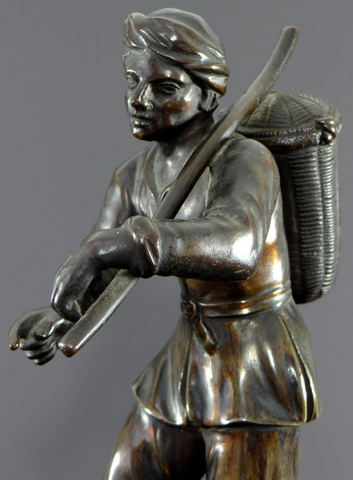 Italy, 18th Century, Bronze Statue Representing a Basket Carrier on a Marble Base.