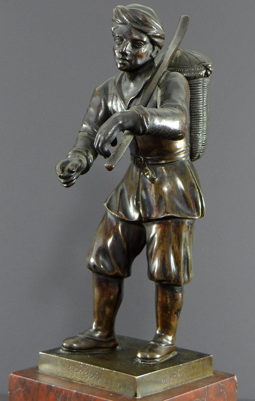 Italy, 18th Century, Bronze Statue Representing a Basket Carrier on a Marble Base.