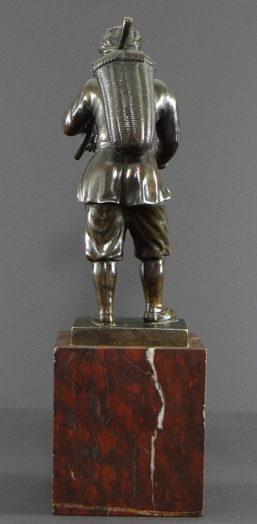 Italy, 18th Century, Bronze Statue Representing a Basket Carrier on a Marble Base.