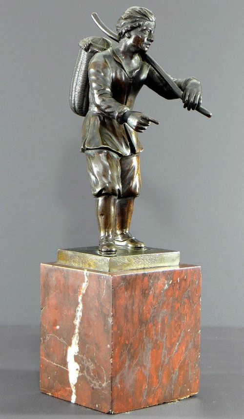 Italy, 18th Century, Bronze Statue Representing a Basket Carrier on a Marble Base.