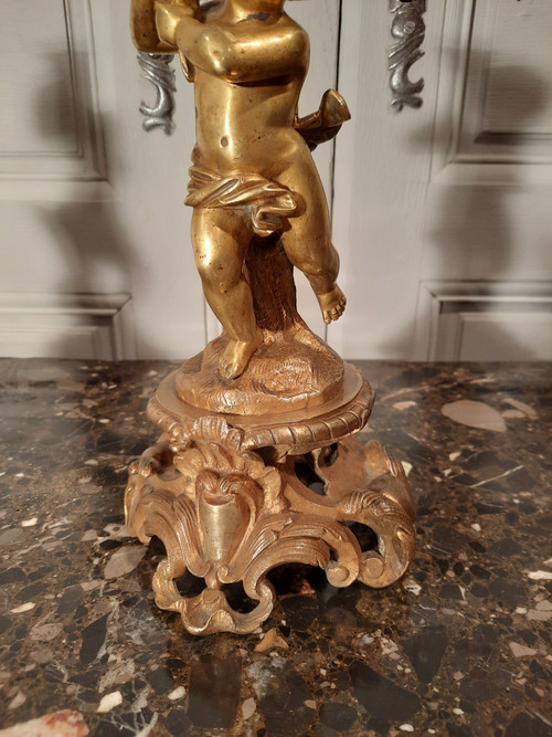 Pair of bronze cherubs in Louis XV style from the 19th century.