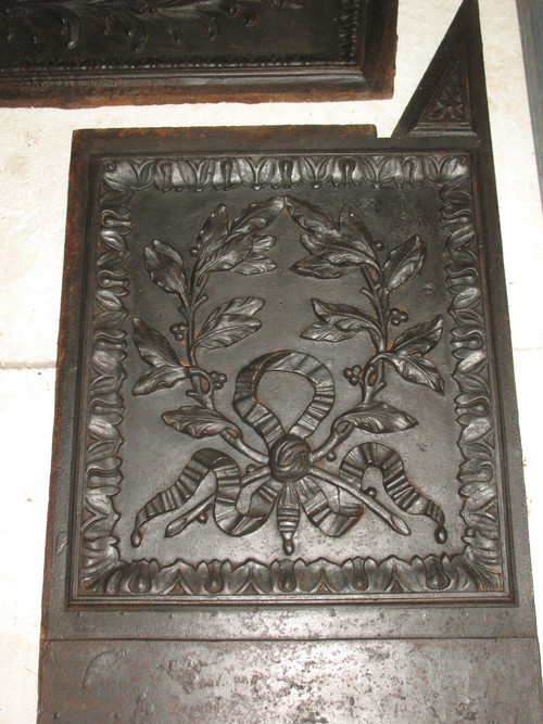 Louis XVI period fireplace in Turquin blue marble complete with its 18th century cast iron hearth 
